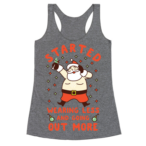 Santa Wearing Less and Going Out More Racerback Tank Top