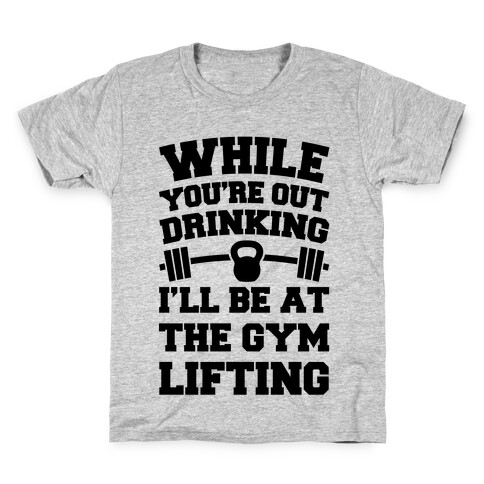 While You're Drinking I'm Lifting Kids T-Shirt